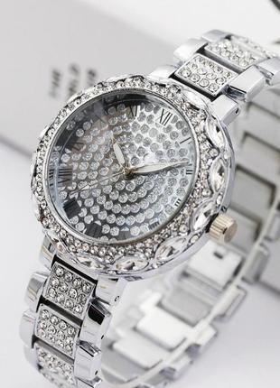 Жіночий наручний годинник з камінням7 фото