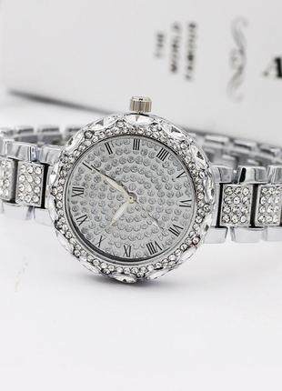 Жіночий наручний годинник з камінням9 фото