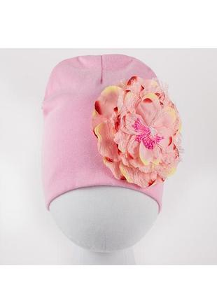 Демисезонная розовая шапочка на девочку свитчком большой цветок