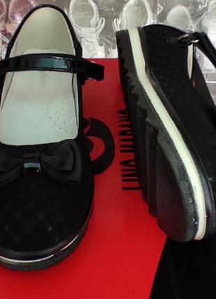 Школьные туфли для девочки черные замшевые на платформе2 фото