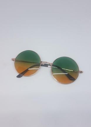 Сонцезахисні / іміджеві окуляри круглі кольорові зелено-жовті1 фото