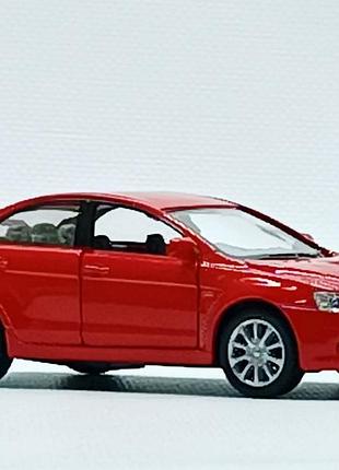 Машина kinsmart "mitsubishi lancer evolution" червоний kt5329w2 фото