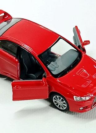 Машина kinsmart "mitsubishi lancer evolution" червоний kt5329w