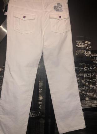 Стильные белые брендовые брюки8 фото