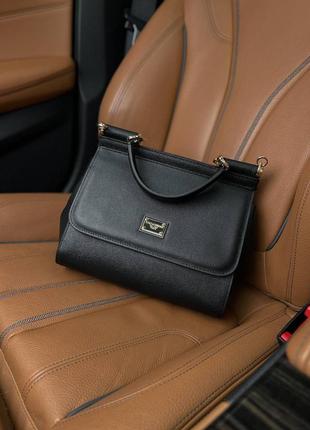 Стильная брендовая сумочка в премиальной коже. цвет черный.