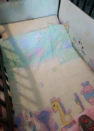 Детская кроватка с маятниковым механизмом +матрас+постольный комплект5 фото
