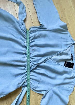 Блакитне джинсове плаття з бічними кишенями8 фото