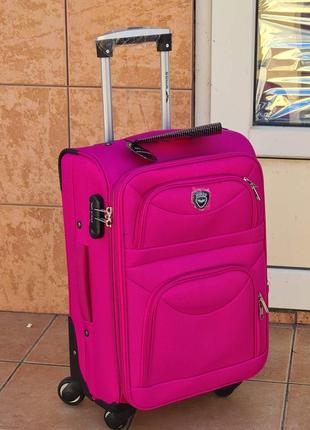 Чемодан  валіза wings  6802 poland 🇵🇱  pink  на 4-х колесах1 фото