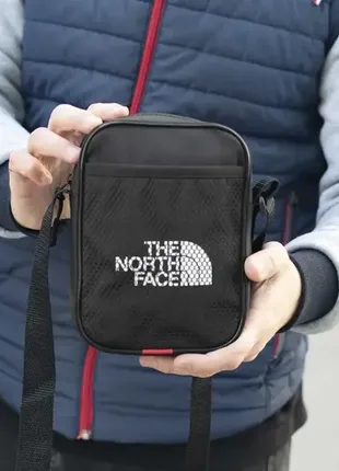 Спортивна барсетка месенджер the north face через плече тканинний чорний