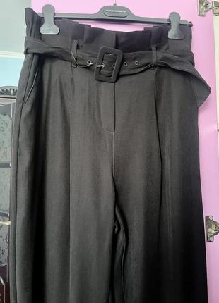 Женские черные брюки из вискозы6 фото