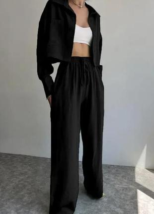 Костюм укороченная рубашка в стиле оверсайз и широкие прямые брюки черный2 фото