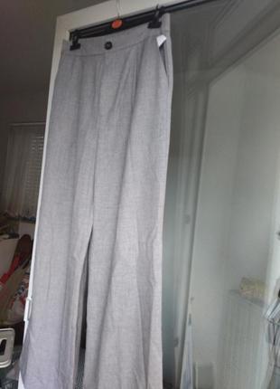 Женские брюки - палаццо серого цвета1 фото