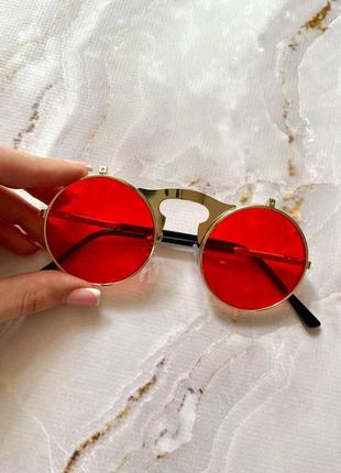 Очки с двойными линзами имиджевые солнцезащитные  круглые в стиле steampunk красного цвета в золотистой оправе4 фото