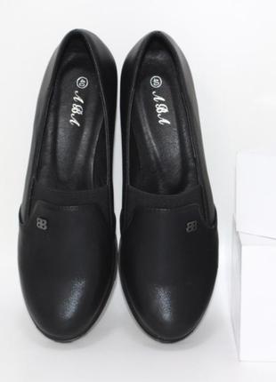 Черные осенние женские туфли на танкетке4 фото