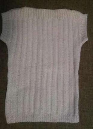 Тепла в'язана жилетка