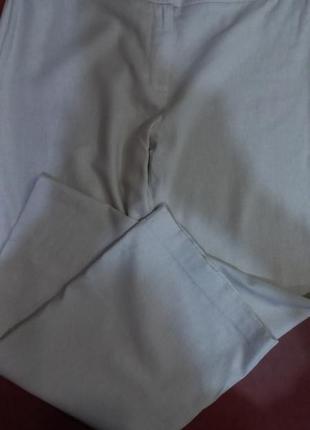 Льняные брюки бежевого цвета6 фото