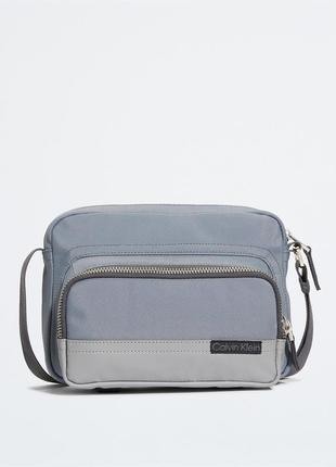Нова сумка calvin klein (ck utility camera bag unisex) з американцями
