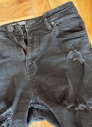 Черные порванные джинсы5 фото