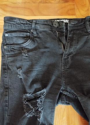 Черные порванные джинсы4 фото