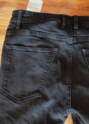 Черные порванные джинсы7 фото