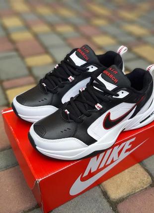 Мужские кроссовки nike air monarch черные с белым с красным / smb