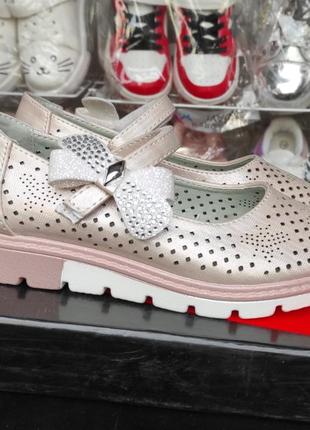 Рожеві туфлі для дівчинки на платформі перфорація9 фото