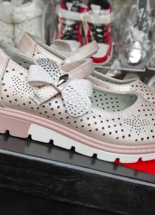 Рожеві туфлі для дівчинки на платформі перфорація8 фото