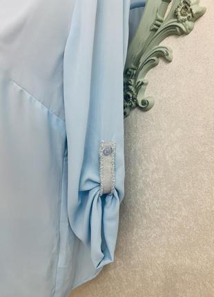Шикарная дизайнерская блуза небесного цвета с серебристой отделкой!!!6 фото