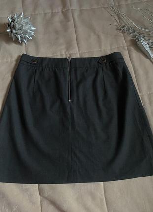 Короткая юбка-карандаш мини черного цвета с застежкой сзади2 фото
