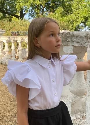 Біла нарядна блузка для дівчинки підлітка з коротким рукавом натуральна бавовна шкільна святкова блуза в школу з воланами1 фото
