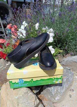 Туфлі на дівчинку шкільні нові чорні бантики в подарунок2 фото