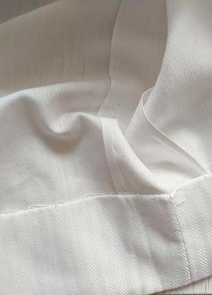 Базова біла спідниця в смужку.6 фото