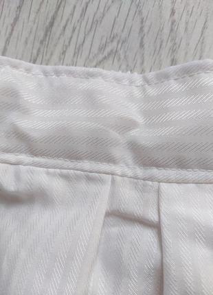 Базова біла спідниця в смужку.7 фото