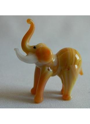 Статуетка скляна мініатюра слон рудий1 фото