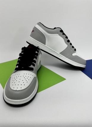 Кросівки світло-сірі, низькі типу аір джо6 фото