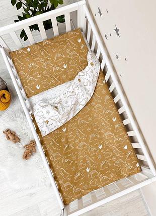 Сменная постель в кроватку дино