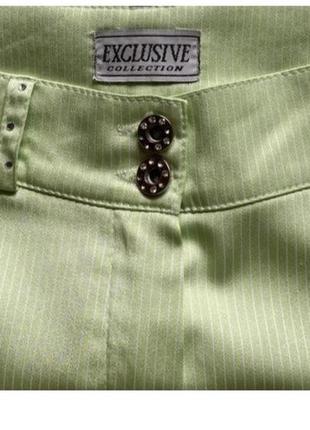 Ідеальні, стильні штани кльош, розкльошені, висока посадка, exclusive collection, салатові, зелені, зі стразами5 фото