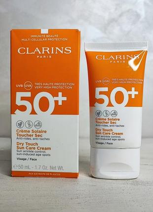 Сонцезахисний крем для обличчя
clarins sun care dry touch face cream spf 50+