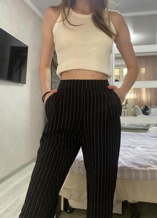 Жіночі брюки в полосочку favorite style розмір xs