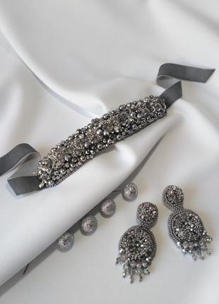 Набір вечірніх прикрас, браслет і сережки сріблястого кольору2 фото