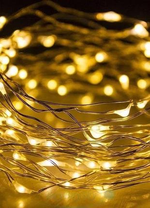 Cветодиодная гирлянда роса на батарейках теплый белый 5м 50 led золотая новогодняя проволочная нить лед желтый5 фото