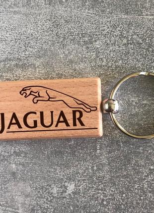 Деревянный брелок с логотипом jaguar  (15010102039)2 фото
