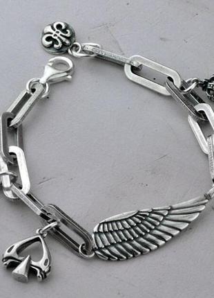 Жіночий срібний браслет корона, крило, крісет, серце, кельтська лілія 21 грам1 фото