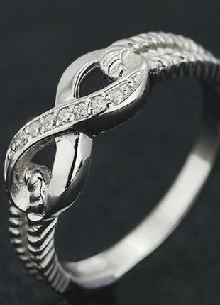 Серебряное женское кольцо бесконечность1 фото