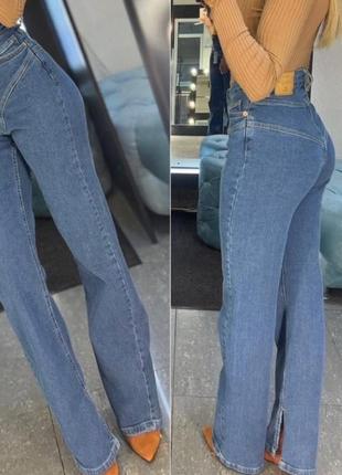 Стильні жіночі джинси на ґудзиках з високою посадкою, джинси синього кольору, трендові джинси з розрізами7 фото