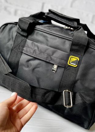 Дорожная сумка черная спортивная из полиэстра средняя через плечо tongsheng5 фото