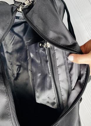 Дорожная сумка черная спортивная из полиэстра средняя через плечо tongsheng8 фото