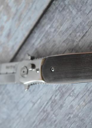 Нож выкидной байкер, бокового выброса с удобным предохранителем7 фото