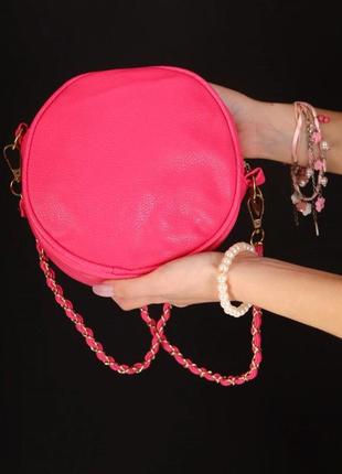 Жіноча кругла сумка клатч, рожева2 фото
