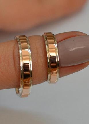 Серебряное обручальное кольцо с вставками из золота2 фото